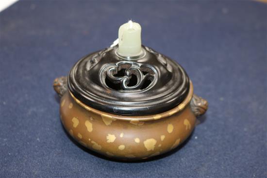 A 17th/18th century Chinese gold splashed bronze censer, Xuande mark, 19th century wood cover, jade finial H.8cm